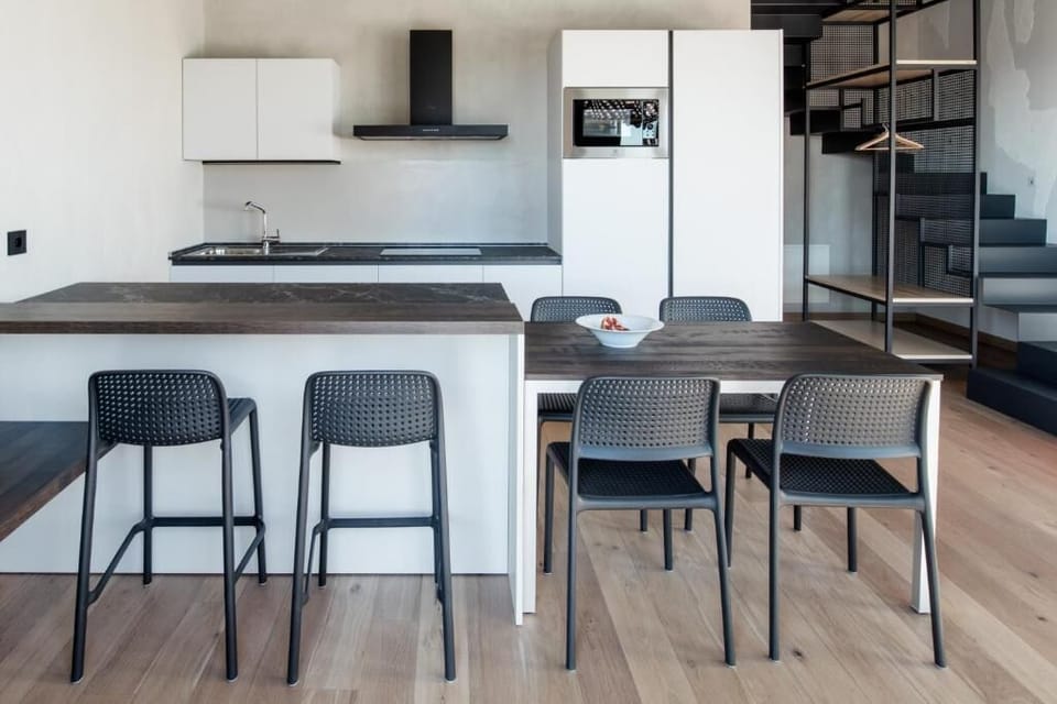 Standard Apartment, Balcony, Pool View | Dining