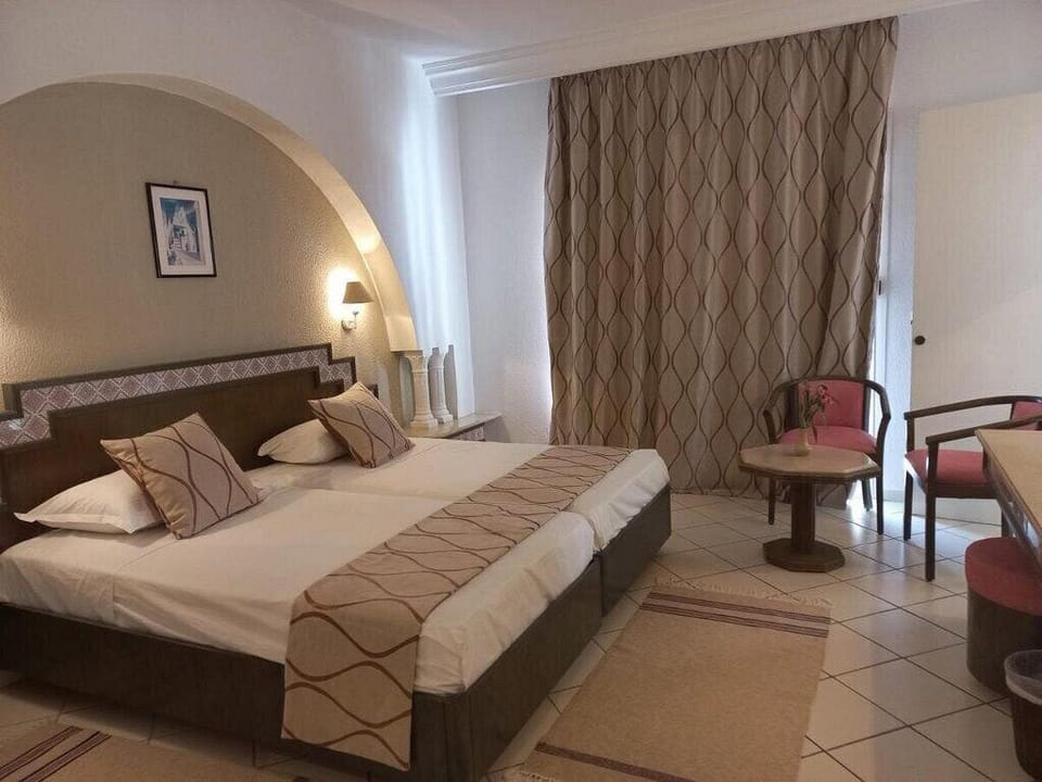 Basic Quadruple Room | In-room safe, free WiFi, bed sheets