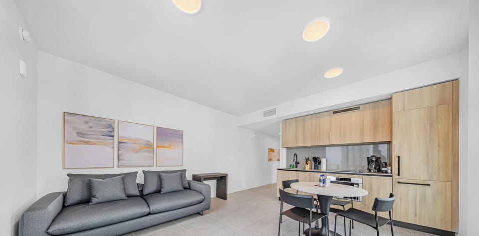 Condo, Balcony, City View | Living area | 36-inch Smart TV with cable channels, table tennis
