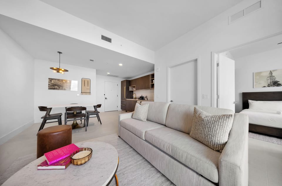 Condo, Balcony, City View | Living area | 36-inch Smart TV with cable channels