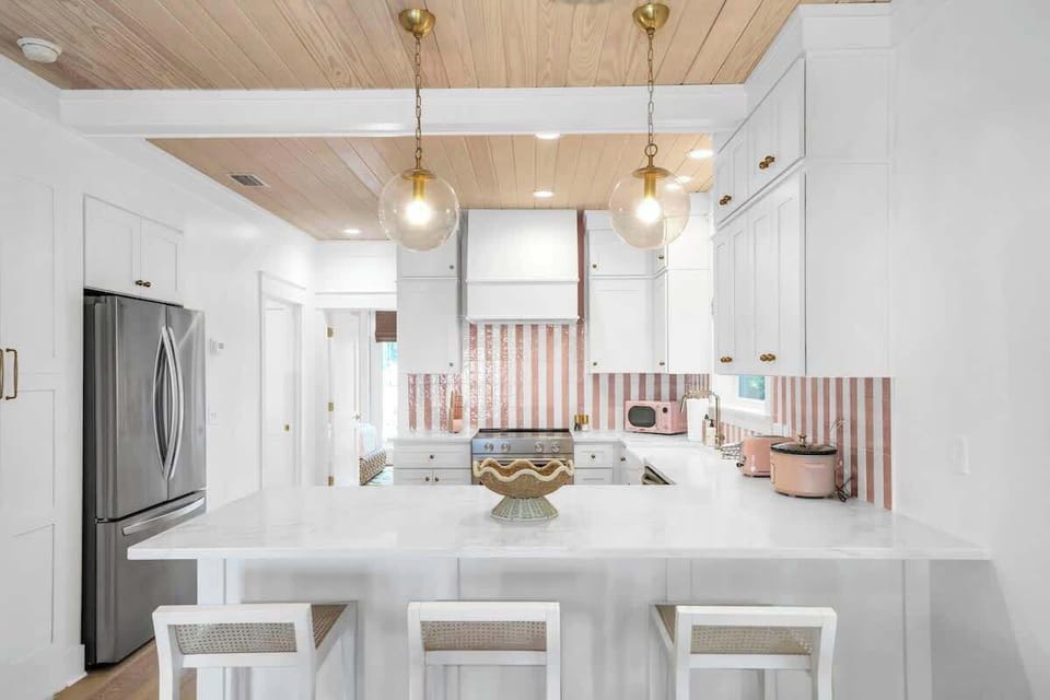 Fully Stocked Kitchen features island seating for 3