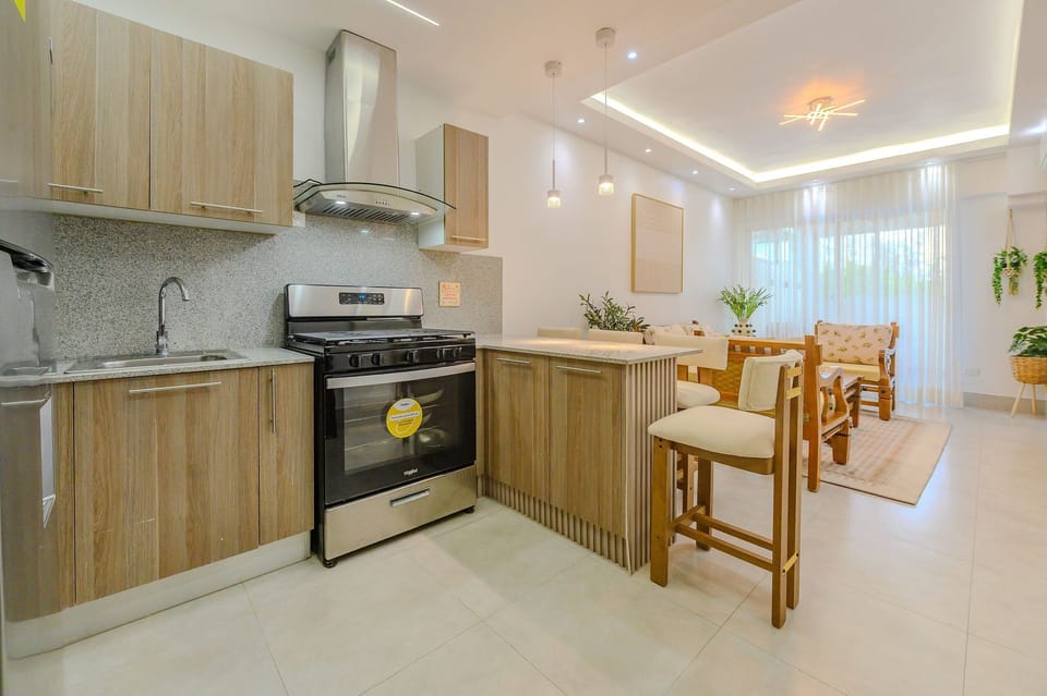 Comfort Apartment | Private kitchen | Fridge, microwave, cookware/dishes/utensils, cleaning supplies
