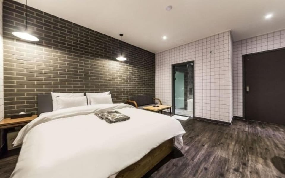 Deluxe Double Room, Non Smoking, City View | Desk, laptop workspace, blackout drapes, free WiFi