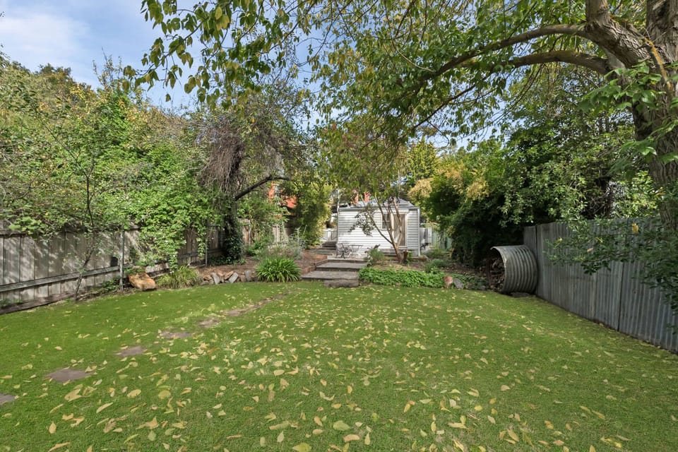 Huge backyard with outdoor furniture 