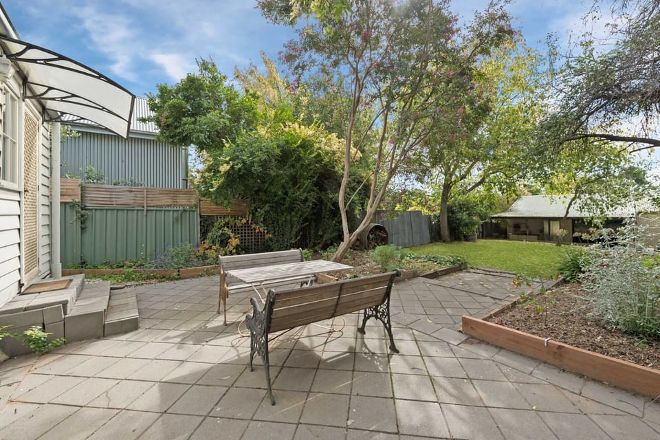 Huge backyard with outdoor furniture 
