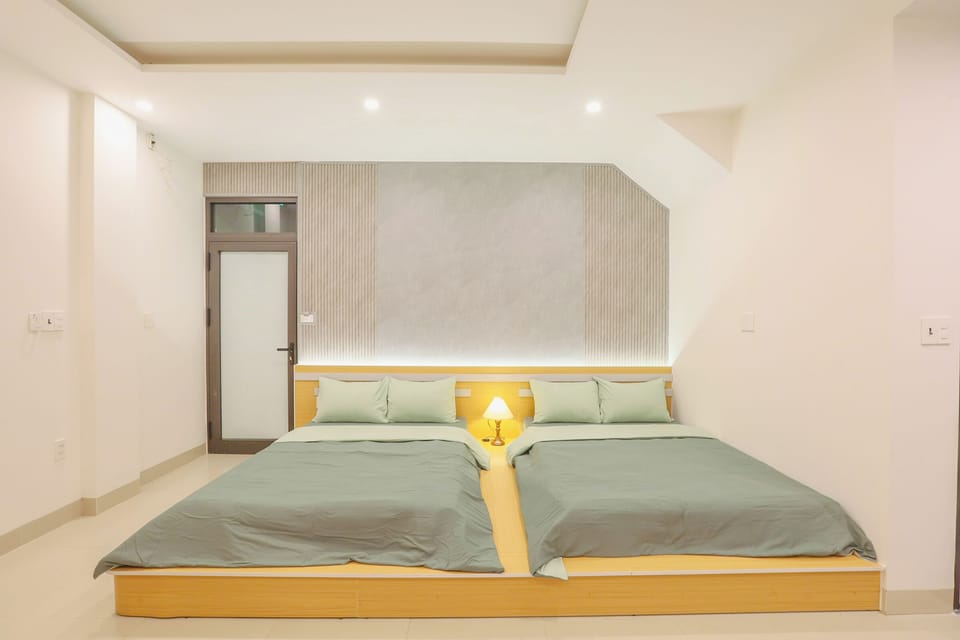 Family Quadruple Room, City View | Desk, laptop workspace, free WiFi
