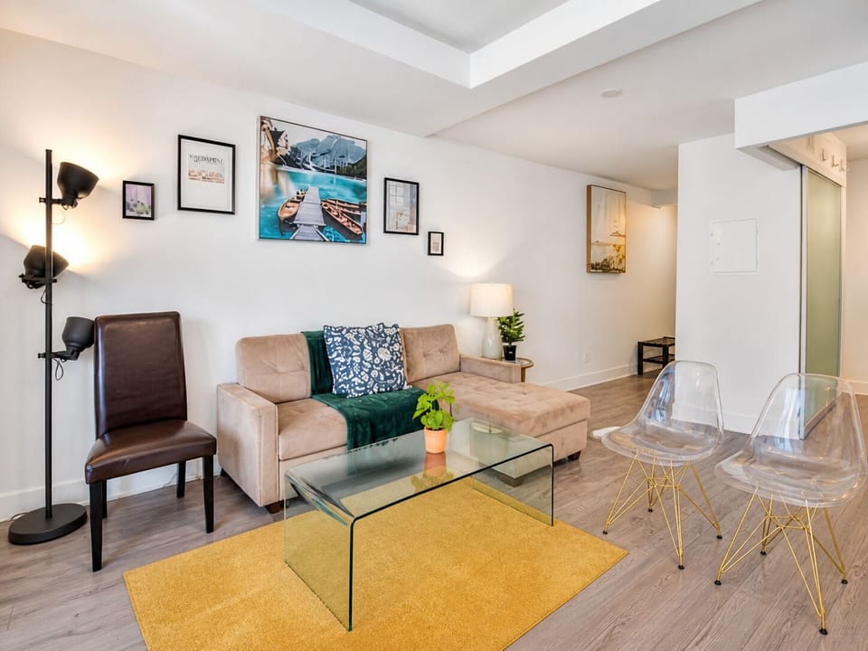 Family Suite | Living area | 50-inch flat-screen TV with digital channels