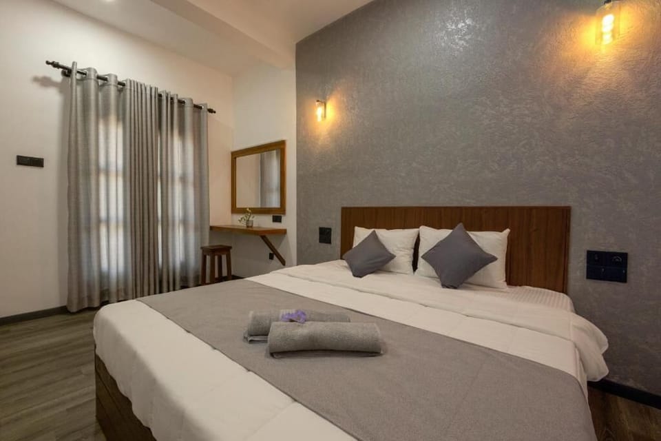 Deluxe Double Room, Garden View | Desk, laptop workspace, free WiFi