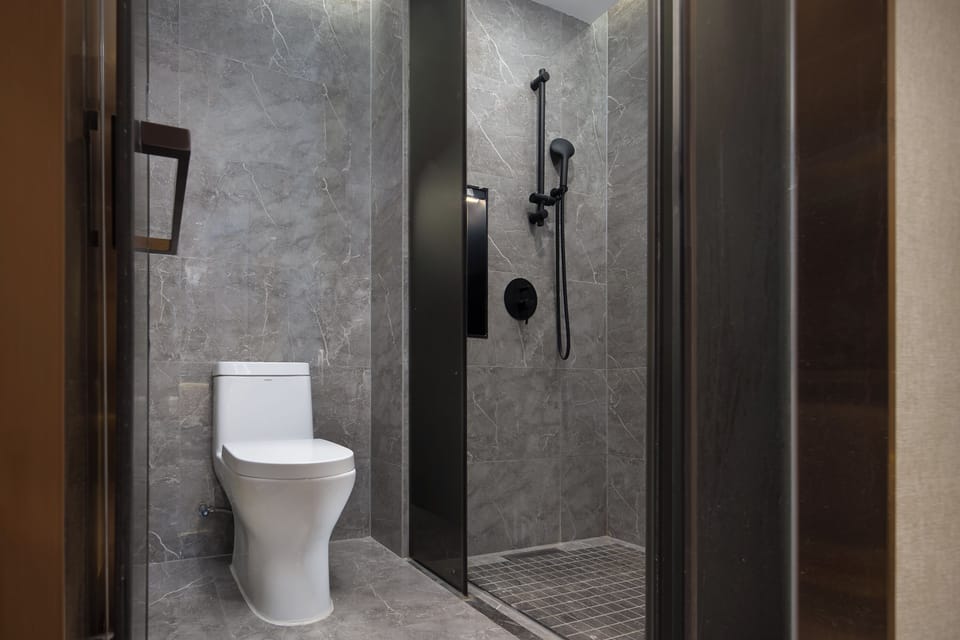 Shower, free toiletries, hair dryer, slippers
