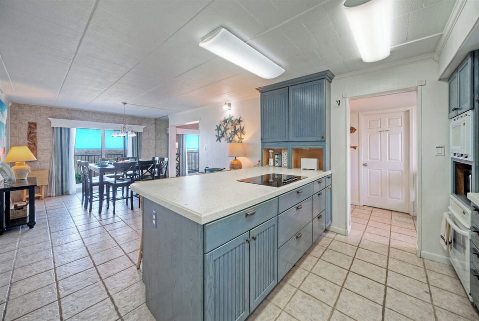 Spacious kitchen with modern appliances.