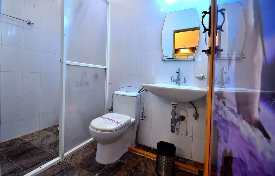 Shower, rainfall showerhead, towels, soap