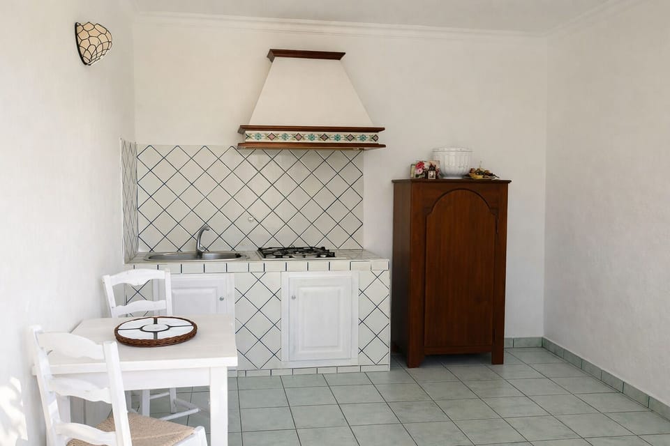 Suite, Patio, Sea View | Private kitchen