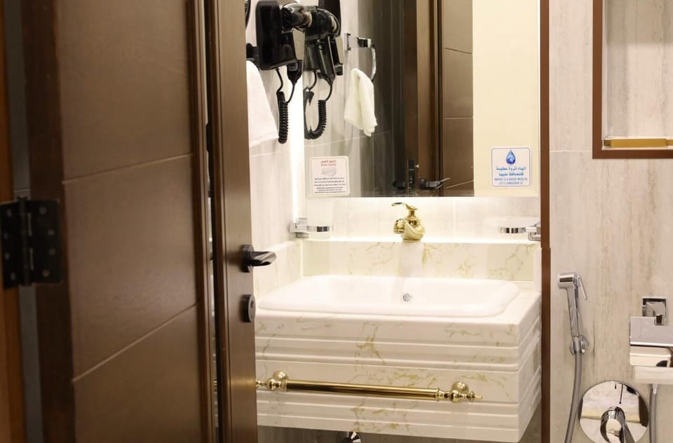 Shower, hair dryer, slippers, bidet