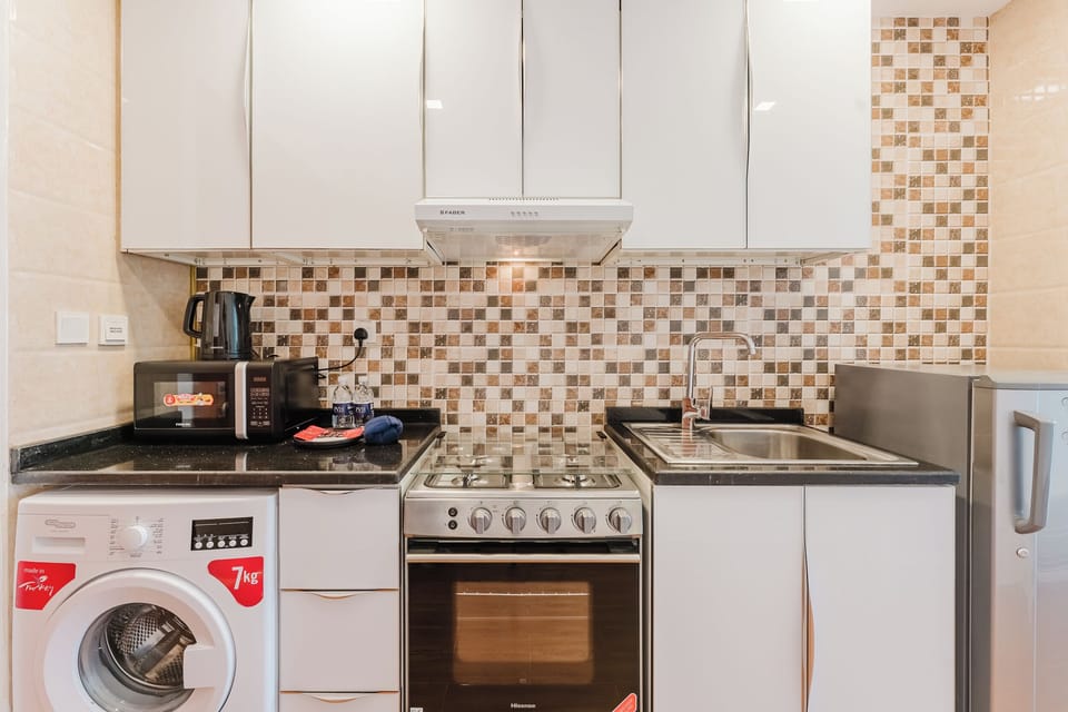 Exclusive Studio, Non Smoking, City View | Private kitchen | Full-size fridge, microwave, oven, stovetop