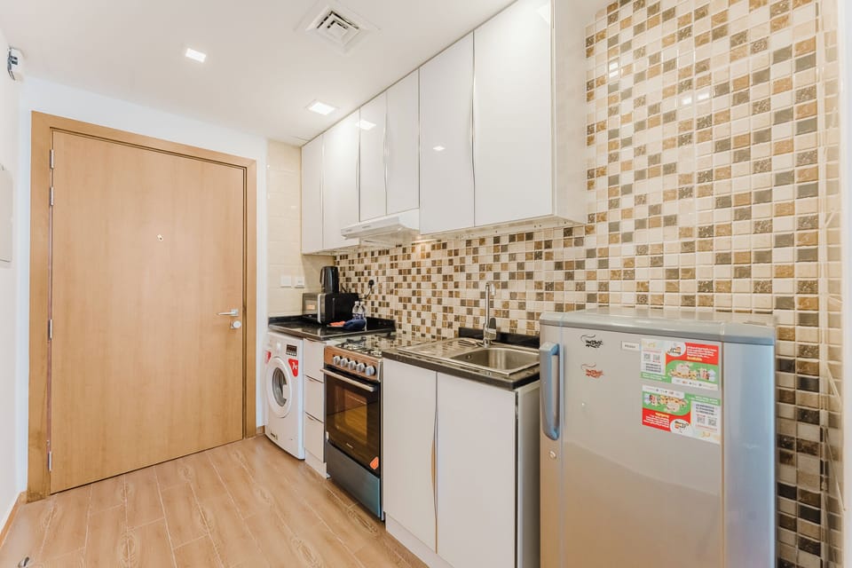 Exclusive Studio, Non Smoking, City View | Private kitchen | Full-size fridge, microwave, oven, stovetop