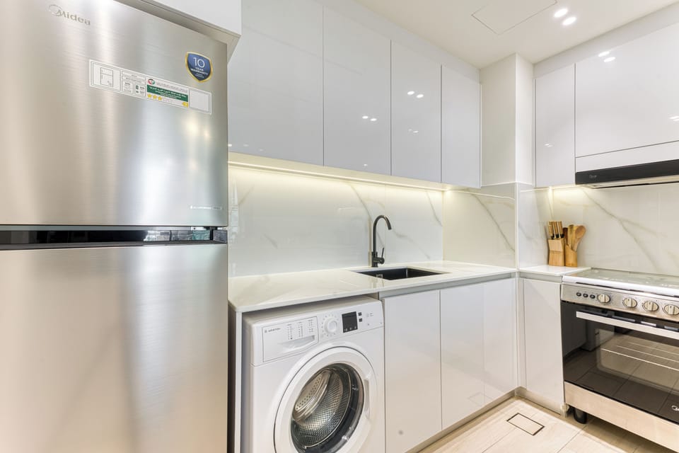 Exclusive Apartment, Non Smoking, Pool View | Private kitchen | Full-size fridge, microwave, oven, stovetop