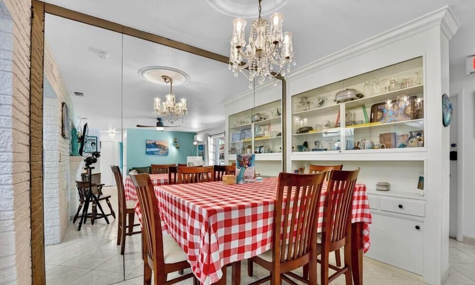 Dining room table expands to seat 10