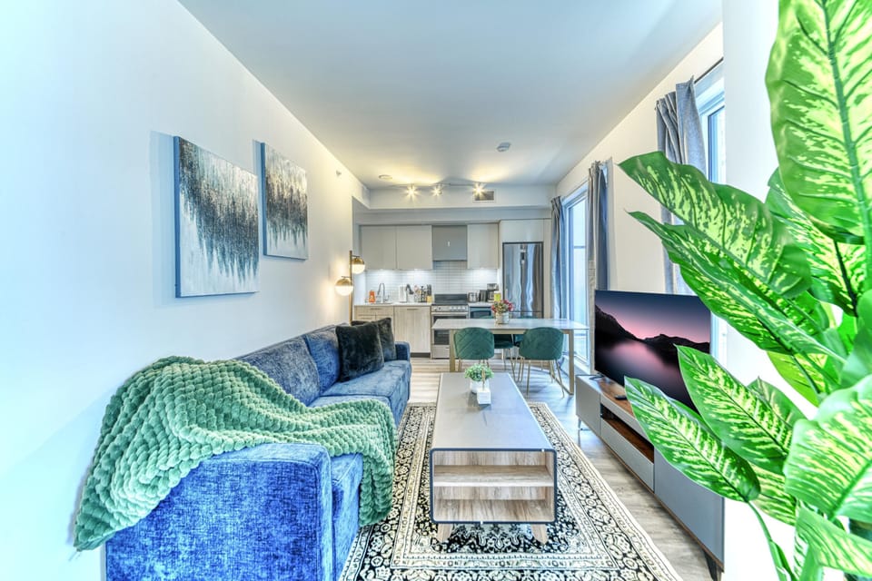 Premier Suite, 2 Bedrooms, Non Smoking, City View | Living area | 50-inch TV with digital channels