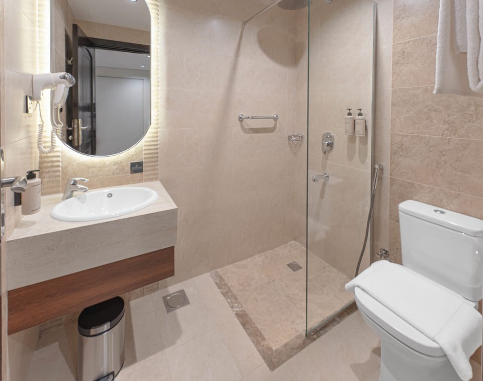 Deluxe Double Room | Bathroom | Separate tub and shower, hair dryer, towels, soap