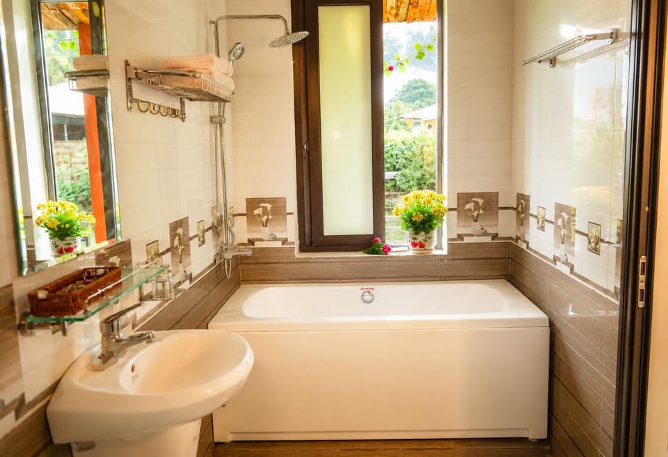 Family Room, Balcony, Lake View | Bathroom | Shower, hydromassage showerhead, free toiletries, hair dryer