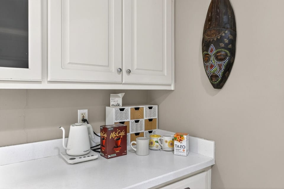 Start your mornings right with a cozy, fully stocked coffee and tea station.