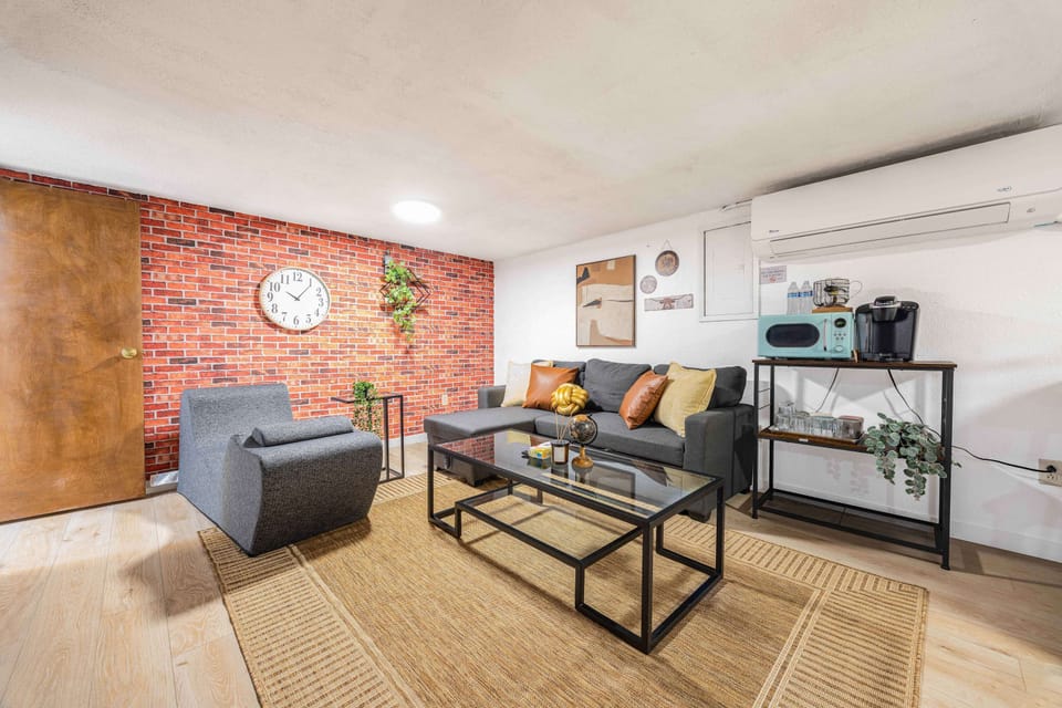 Open living area with a comfortable sofa and plenty of room to unwind.