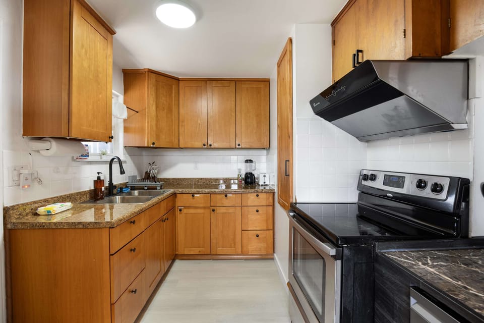 Inviting kitchen with timeless finishes and plenty of storage.