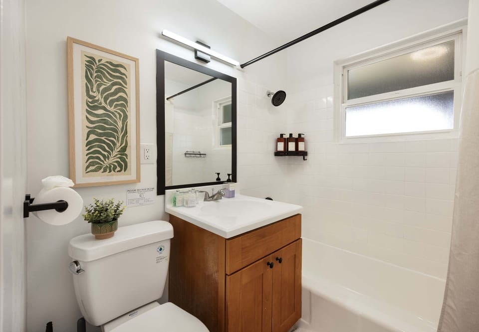 Clean and functional bathroom with modern fixtures and a fresh, bright look.