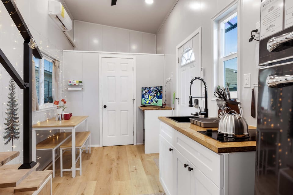 Bright dining nook by the window—perfect for coffee, meals, or catching up on emails.