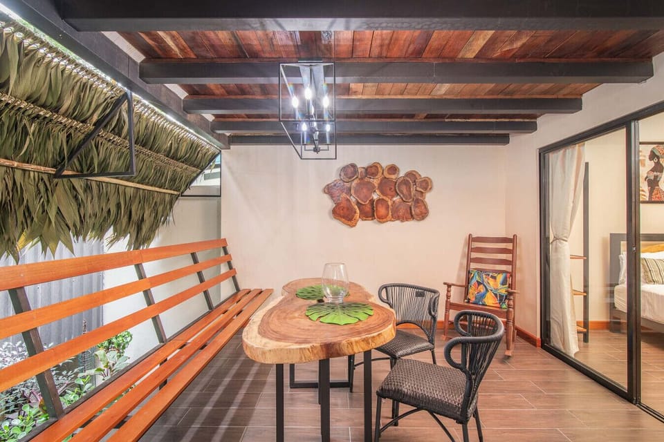 Open dining space connected to kitchen in Puerto Viejo villa