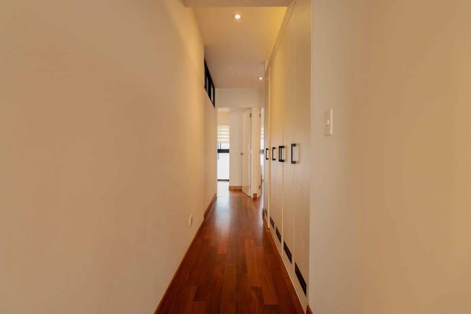 Hallway connecting bedrooms
