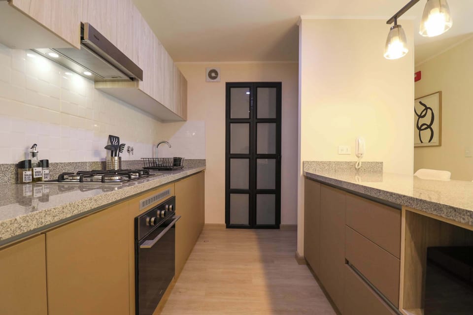 Sleek kitchen design with modern appliances.