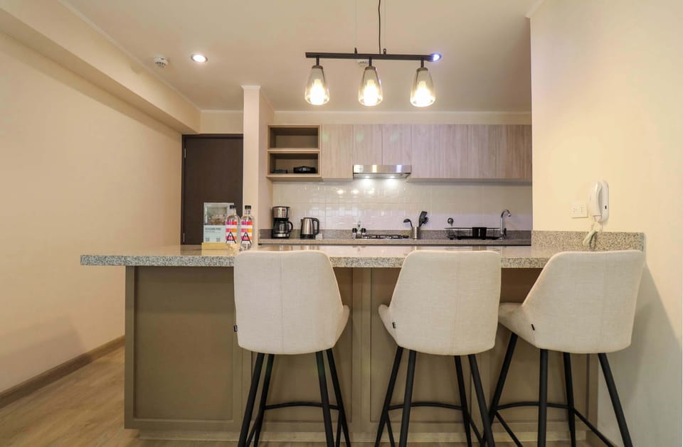 Stylish kitchen with bar seating.