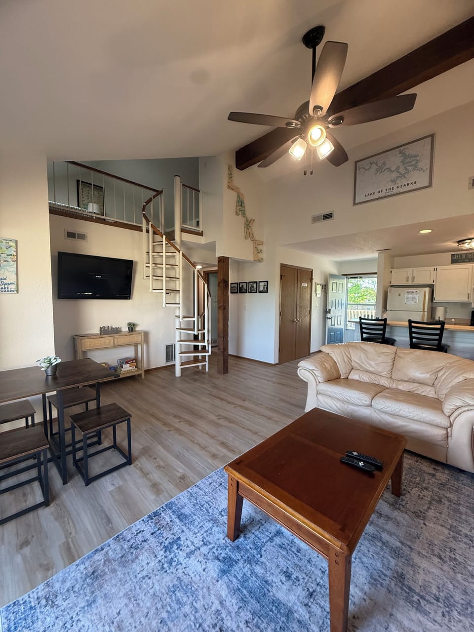 Bright, open-concept living space with vaulted ceilings.