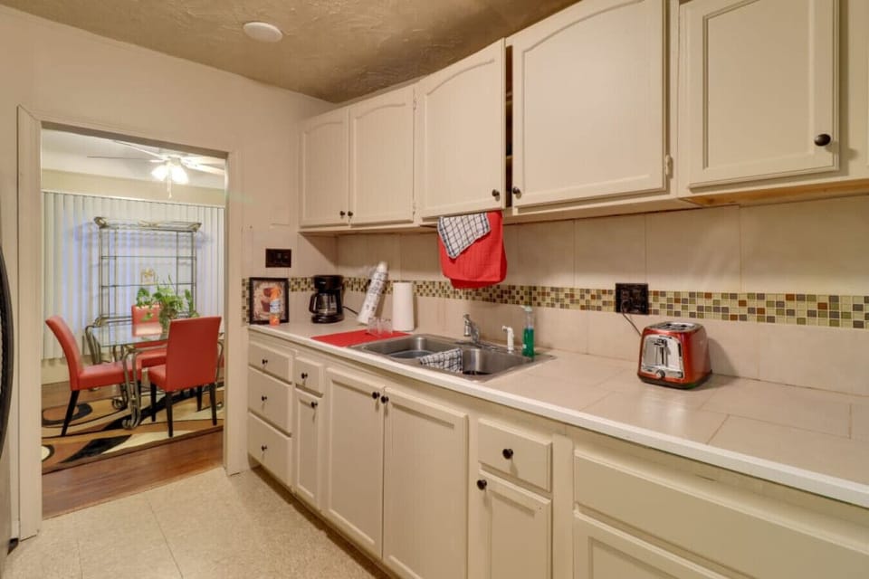 Kitchen | Stainless Steel Sink | Upper Cabinets Tile Backsplash