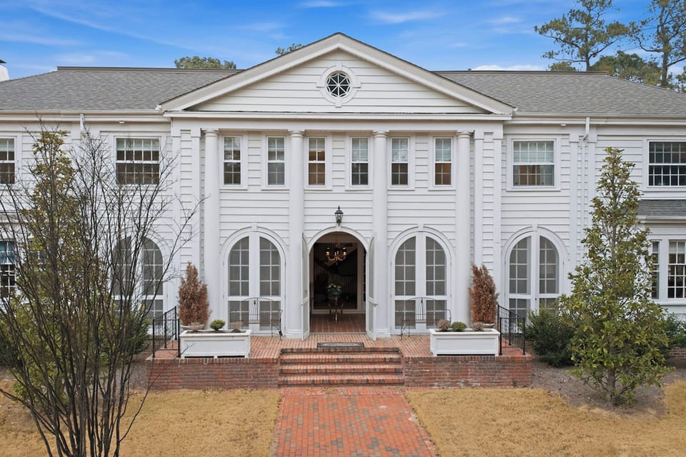 Majestic white colonial mansion exterior