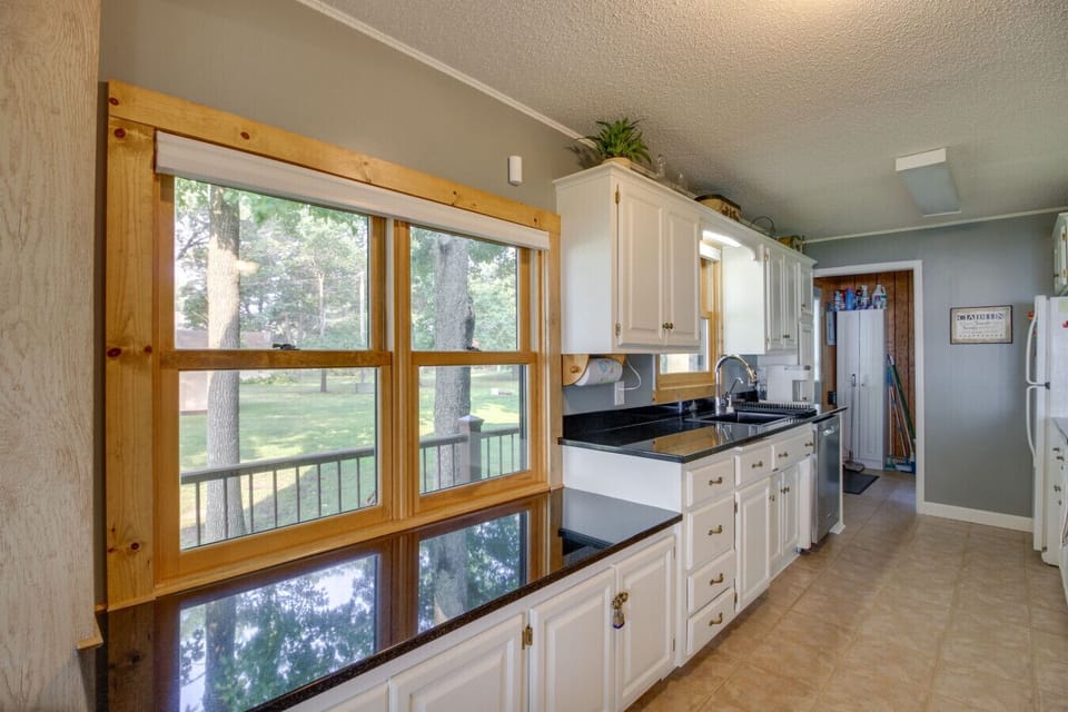 Kitchen | Bright Cabinets & Breakfast Bar Seating