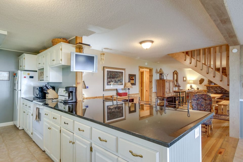 Kitchen | Bright Cabinets & Breakfast Bar Seating