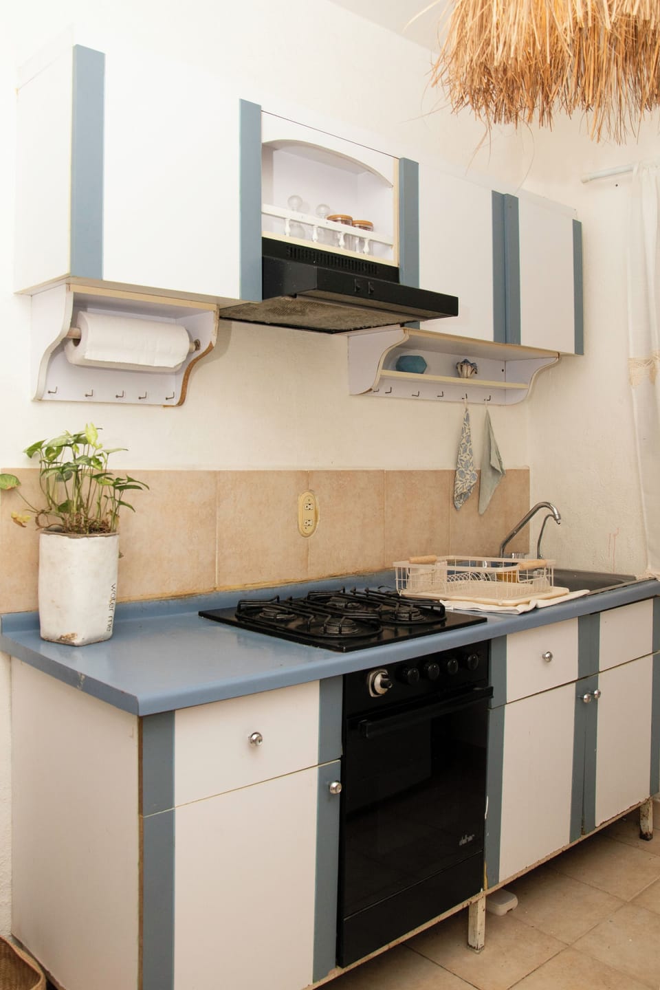 Fridge, microwave, coffee/tea maker, cookware/dishes/utensils