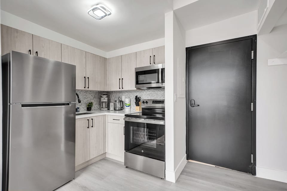 Elevated 1 BDR/1BA Apartment 309 | Private kitchen | Full-size fridge, microwave, oven, stovetop