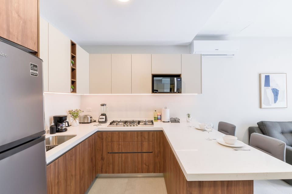 Suite, City View | Private kitchen | Full-size fridge, microwave, stovetop, blender