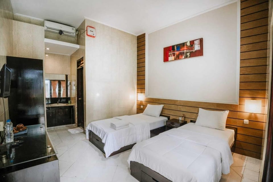 Deluxe Double Room, Pool View | Desk, laptop workspace, free WiFi