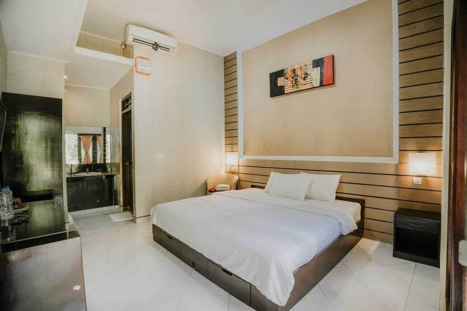 Deluxe Double Room, Pool View | Desk, laptop workspace, free WiFi