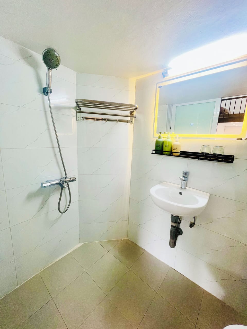 Clean modern bathroom with walk-in shower