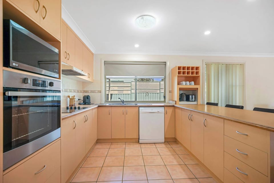 Kitchen + Coffee Pod Machine + Breakfast Bar with Stools