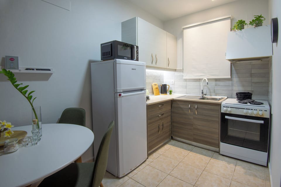 Superior 2 Bedroom Apartment | Private kitchen | Fridge, microwave, stovetop, electric kettle