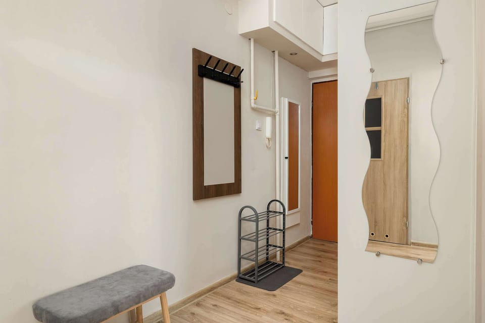 Welcoming hallway with practical storage and a clean, modern look.