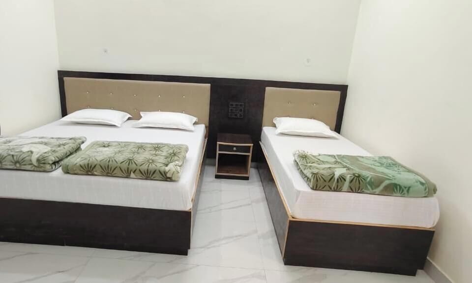 Deluxe Triple Room, Non Smoking, Private Bathroom | Desk, laptop workspace, free WiFi