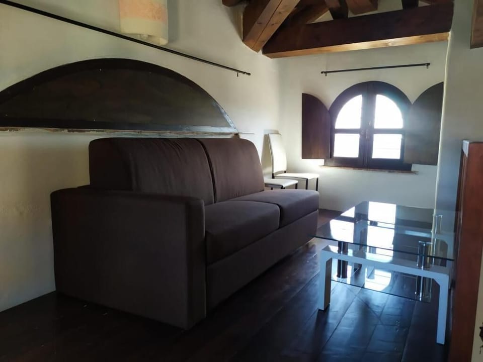 Junior Suite, Sea View | Living area | TV