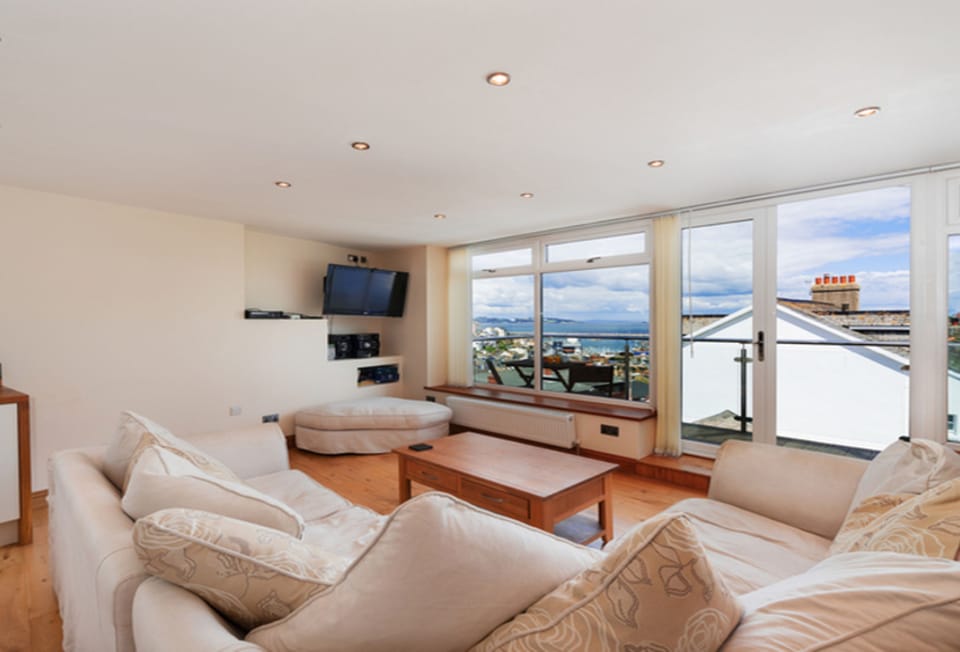 Upper Anzac, Brixham: The bright, open-plan living space designed for comfort and sociable living